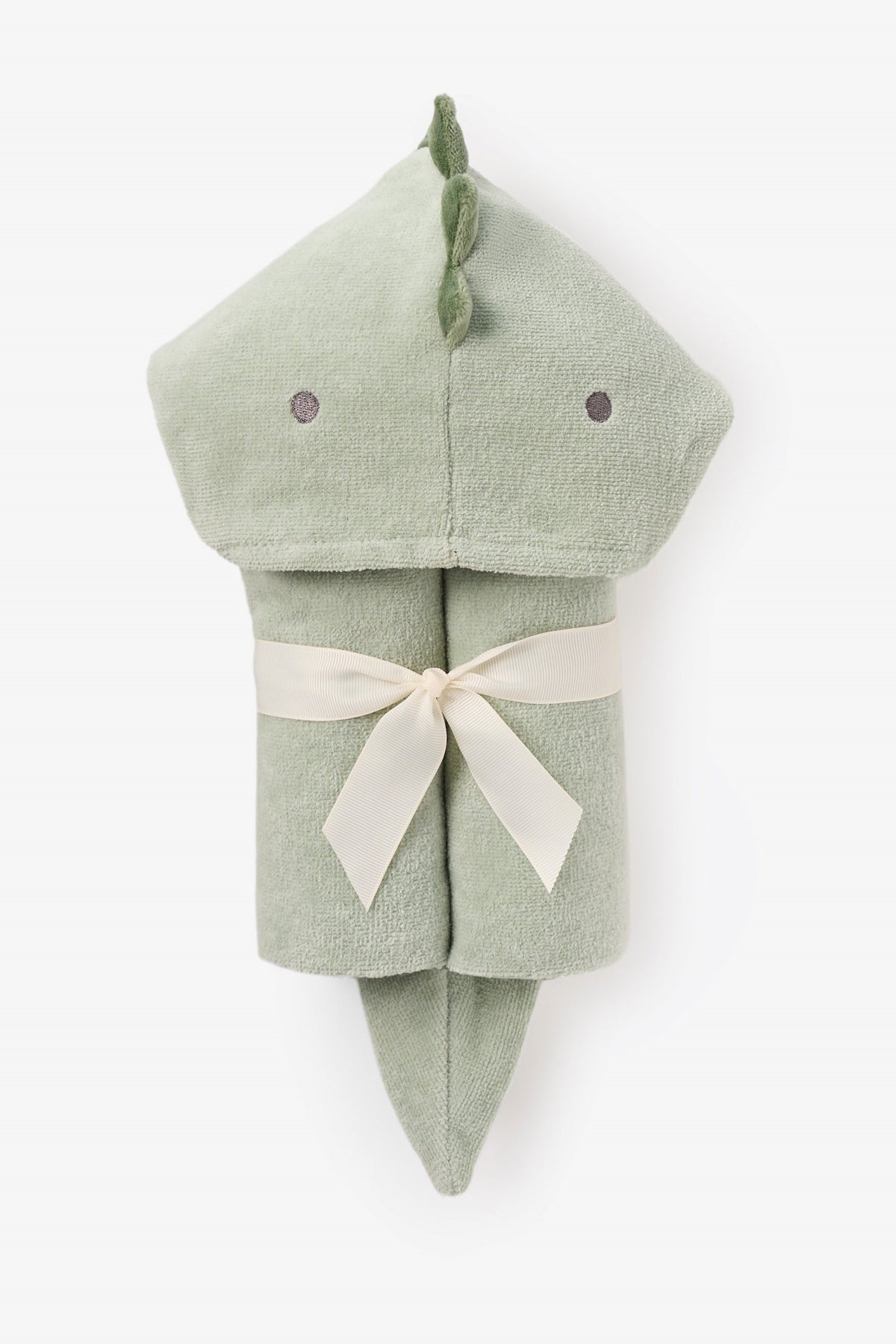 Green dinosaur-shaped hooded towel with a white ribbon on a white background
