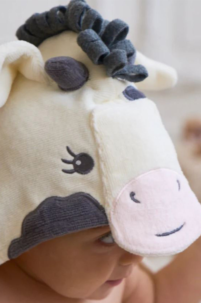 Hooded bath wrap with penguin hood, cream fabric with dark gray face applique