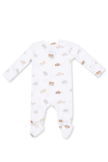 A white long-sleeve footed sleeper with a delicate pattern of small brown and gray puppies in Snuggle Puppy Club print laid flat on a white background.