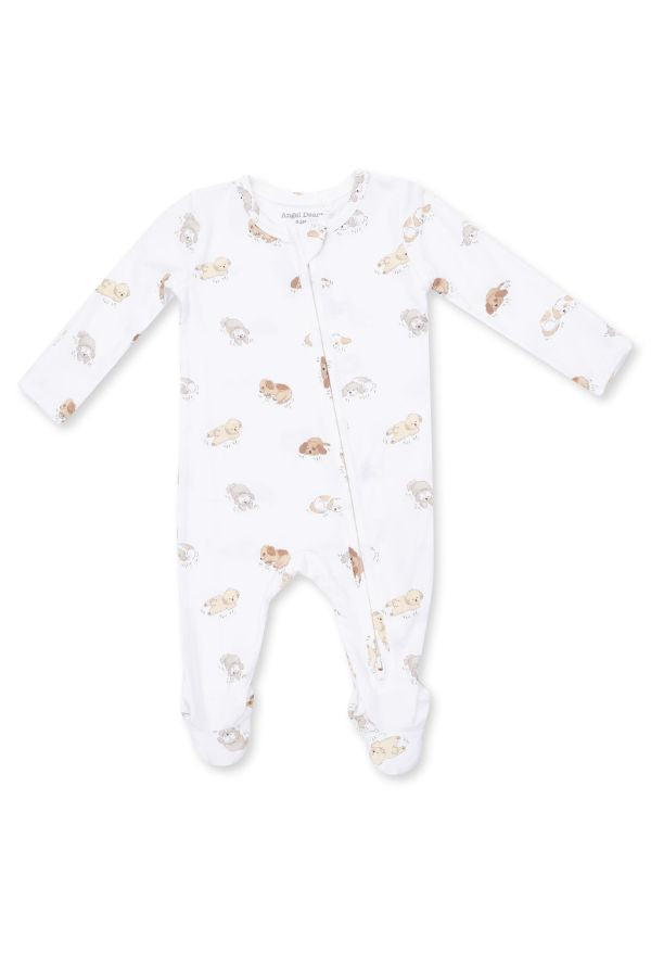 A white long-sleeve baby footed sleeper with an all-over print of Puppy Snuggle Club in beige and brown tones, shown flat on a white background.