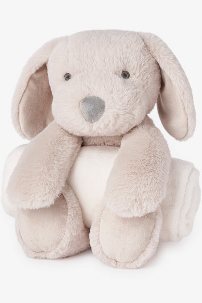 A plush puppy bedtime huggie made from a rolled cream blanket, featuring soft beige fur, floppy ears, small black eyes, and a gray snout, photographed on a clean white background.