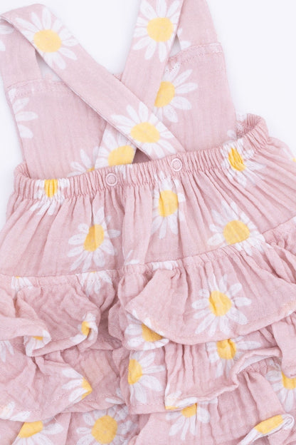 Pink daisy ruffle sunsuit close-up with elastic waist and layered ruffles