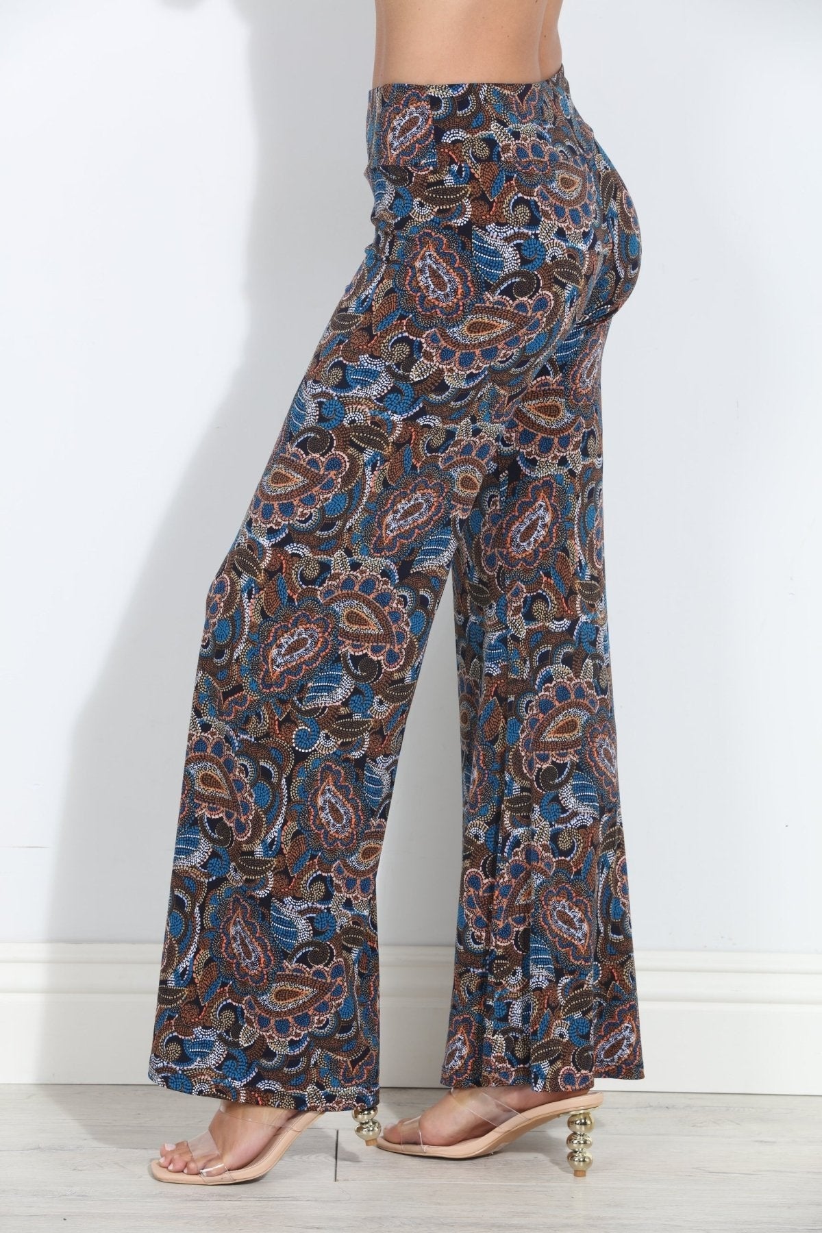 Wide-leg paisley pants in blue with rust and tan motifs, full length flare