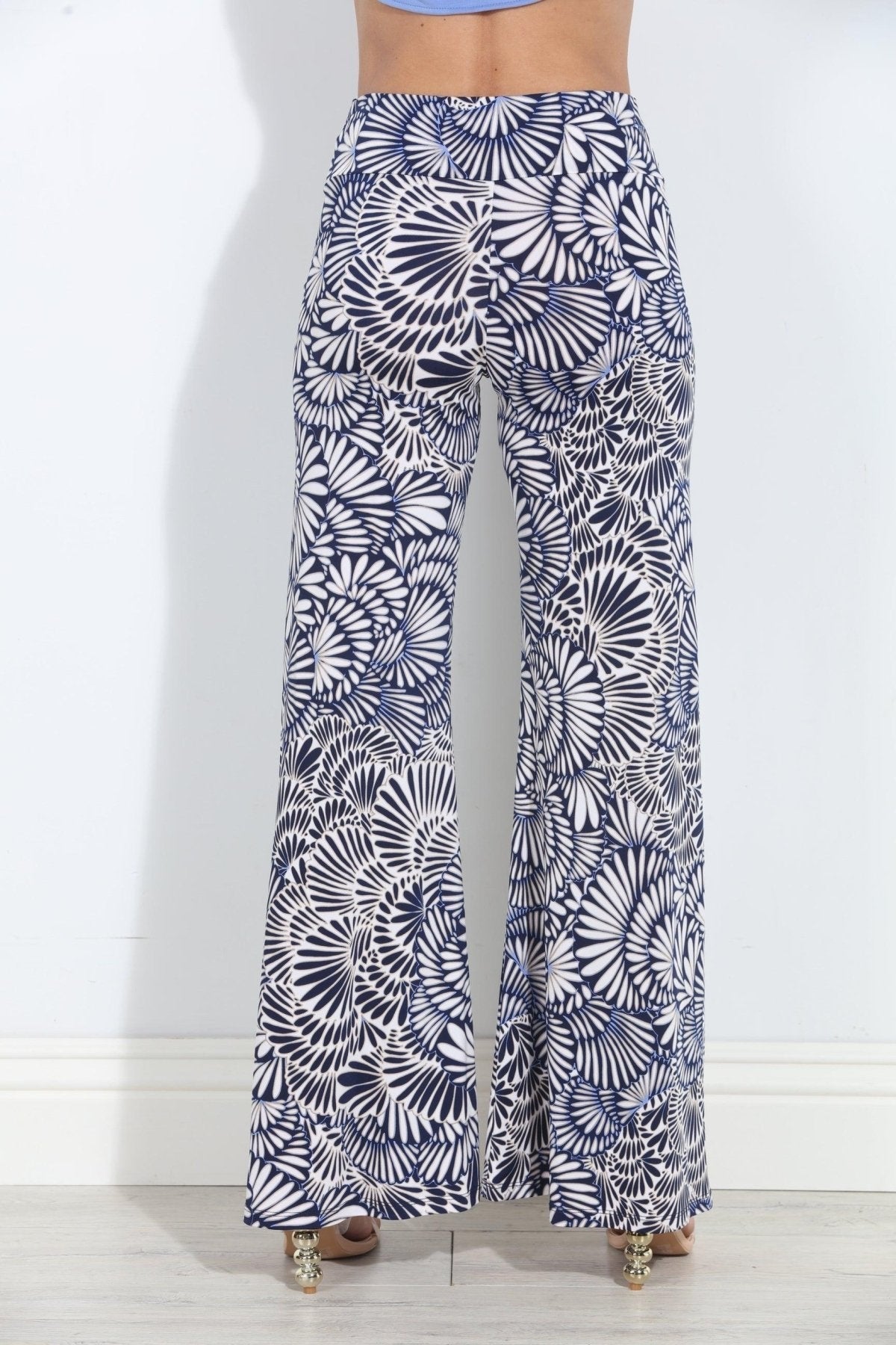 Wide-leg pants in navy-and-white fan/flower print, elastic waist, wide bell legs
