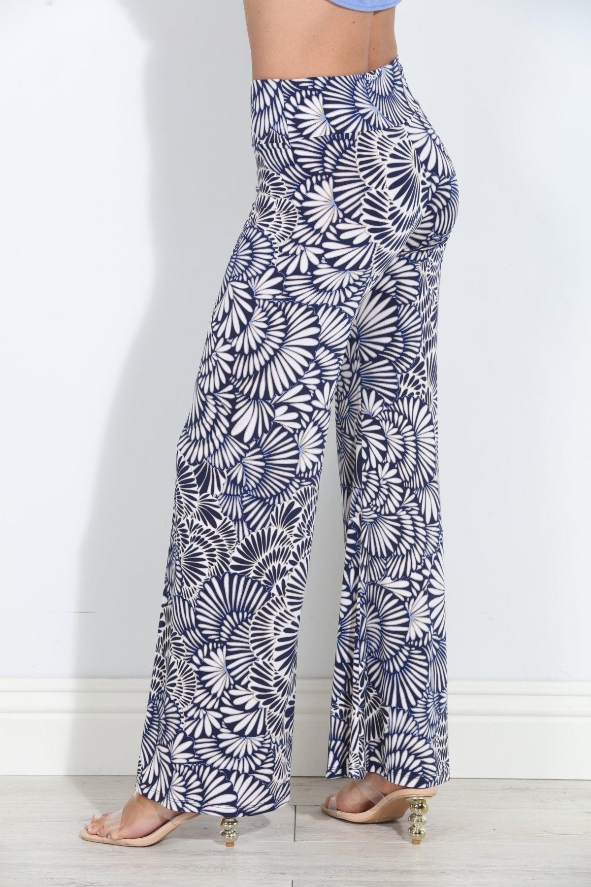 Navy-and-white printed wide-leg pants, high-rise elastic waist, full flare