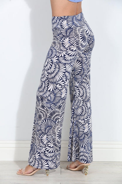 Navy-and-white printed wide-leg pants, high-rise elastic waist, full flare