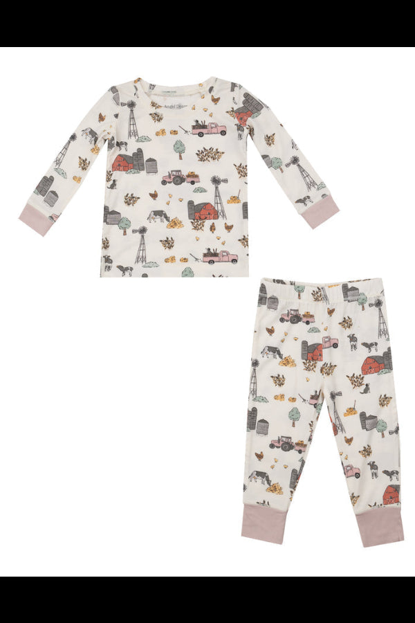Children's long sleeve pajama set with hay farmer pattern on a white background