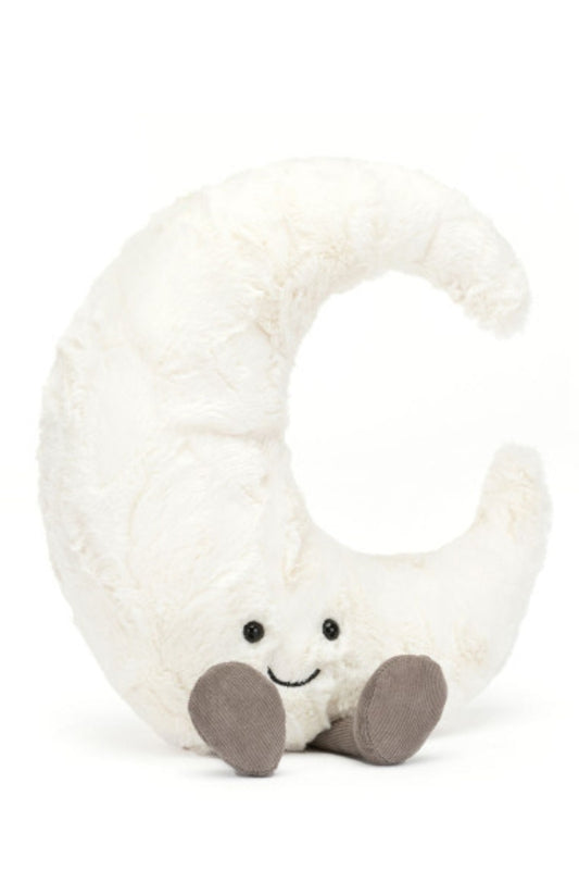 White plush crescent moon stuffed toy with smiley face and gray feet