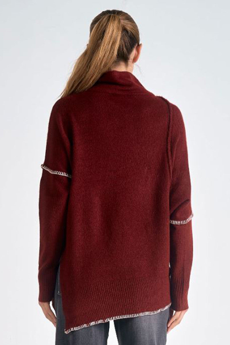 seam detailed asymmetrical sweater in brick back view