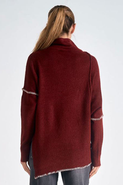 seam detailed asymmetrical sweater in brick back view