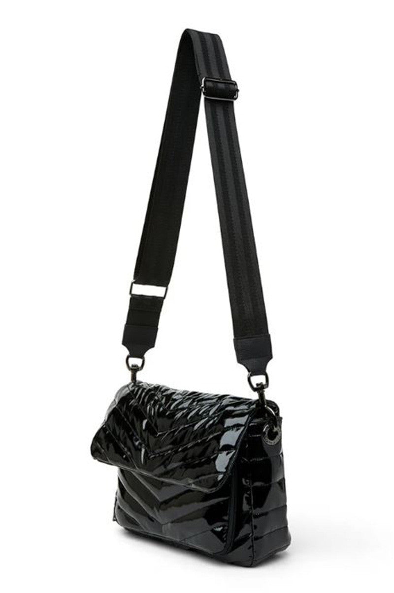 the muse in black patent side view 