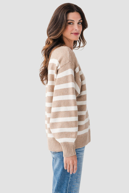 Tan striped sweater with white horizontal stripes, long sleeves and ribbed knit hem
