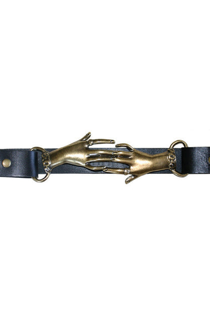 Black leather belt with gold hand design on a white background