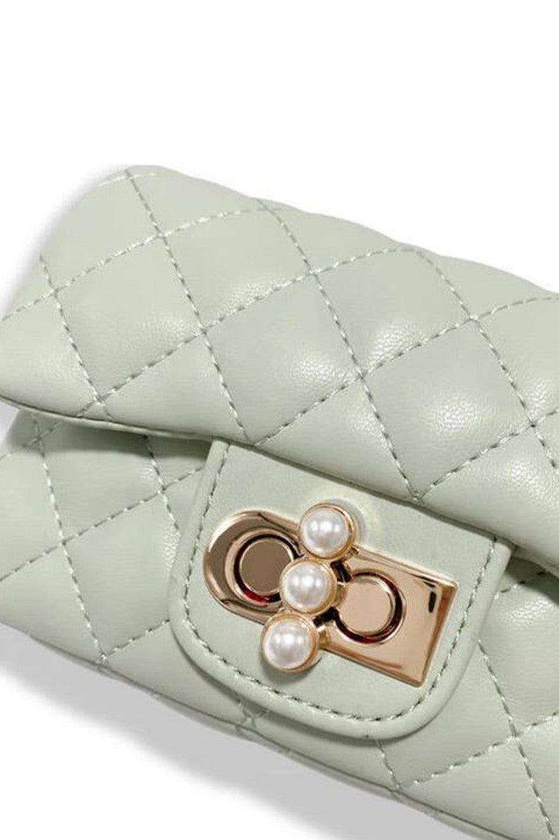 pearl closure quilted purse in green detail view