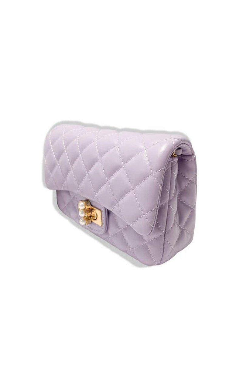 pearl closure quilted purse in purple side view