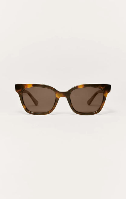 Brown tortoise polarized sunglasses, front view with dark brown lenses