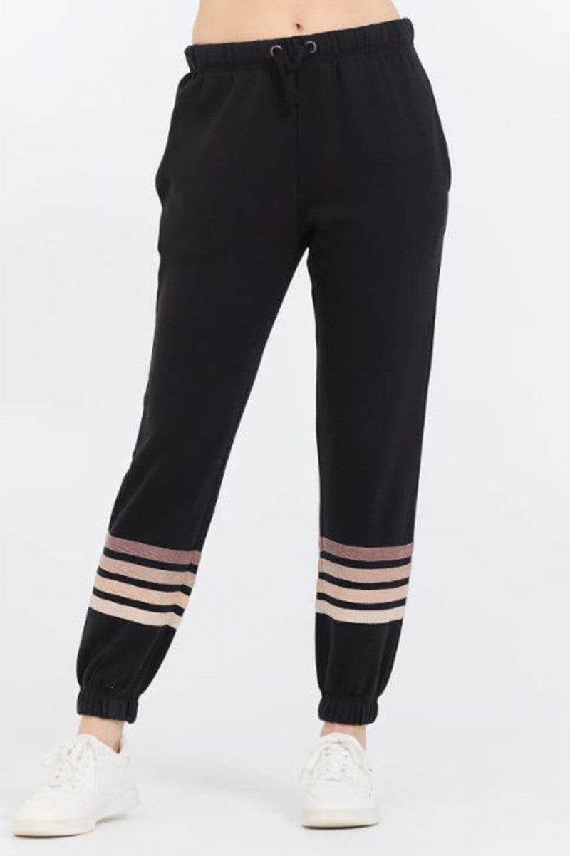 Stripe burnout fleece jogger in black/neutral front view 