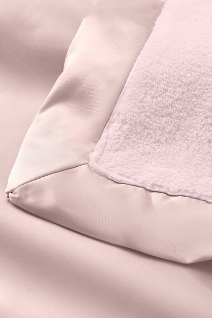 pale pink fleece security blanket with silk edges