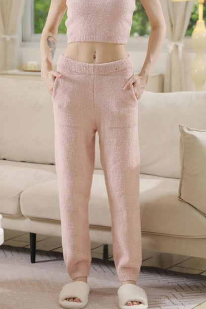 Pants with pockets in pink front view