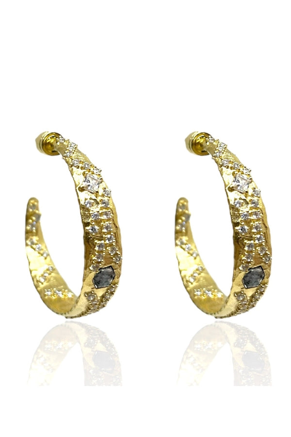 Gold hoop earrings with textured finish and dark inset stones