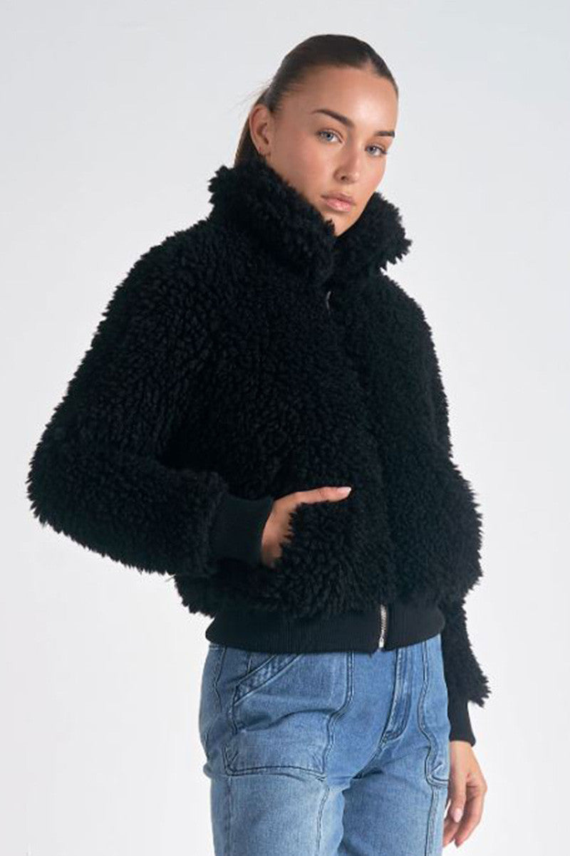 sherpa bomber jacket in black side view