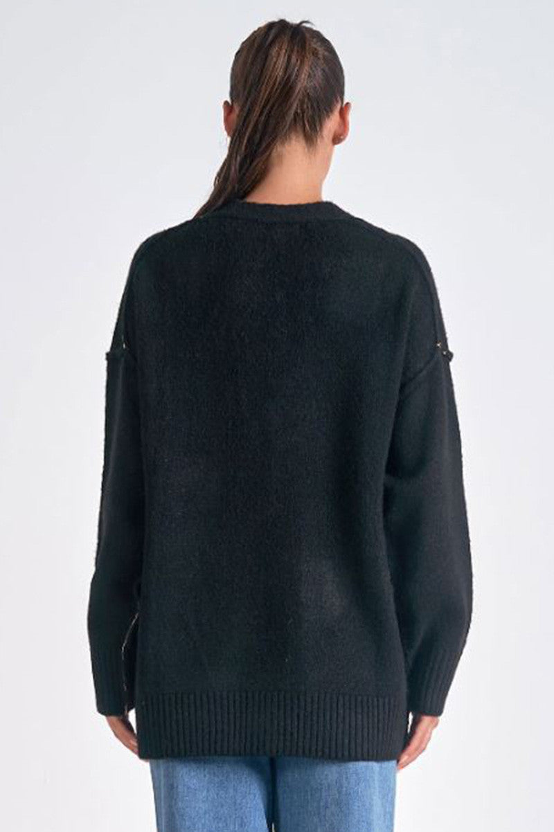 oversized cardigan sweater in black back view