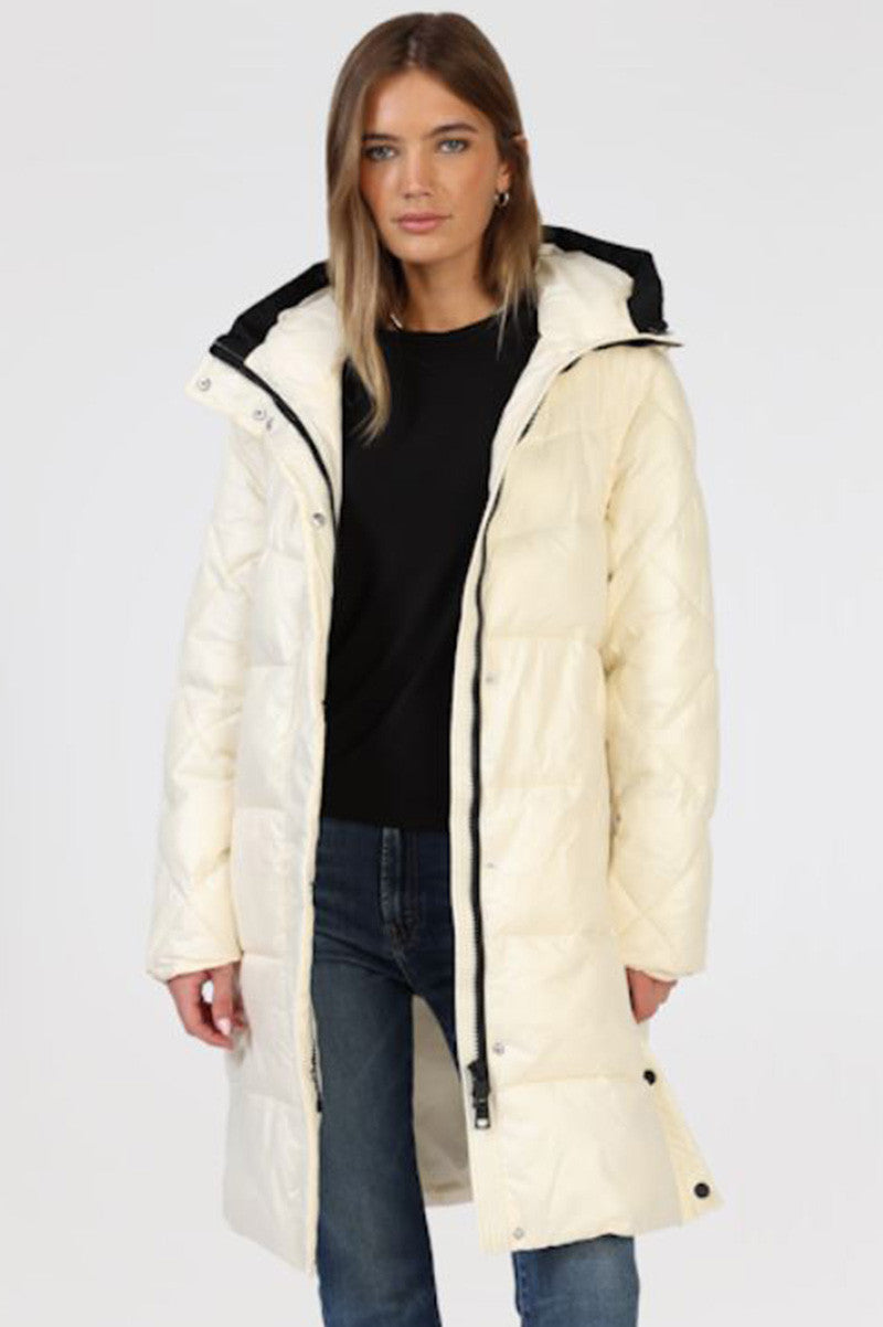 Quilted puffer with zip off sleeve in natural front view