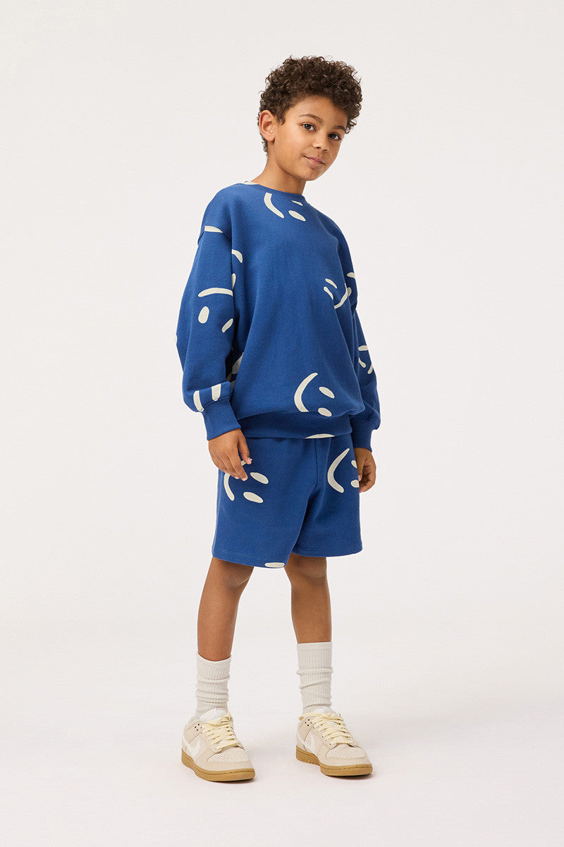 Amil big smiles blue shorts style view