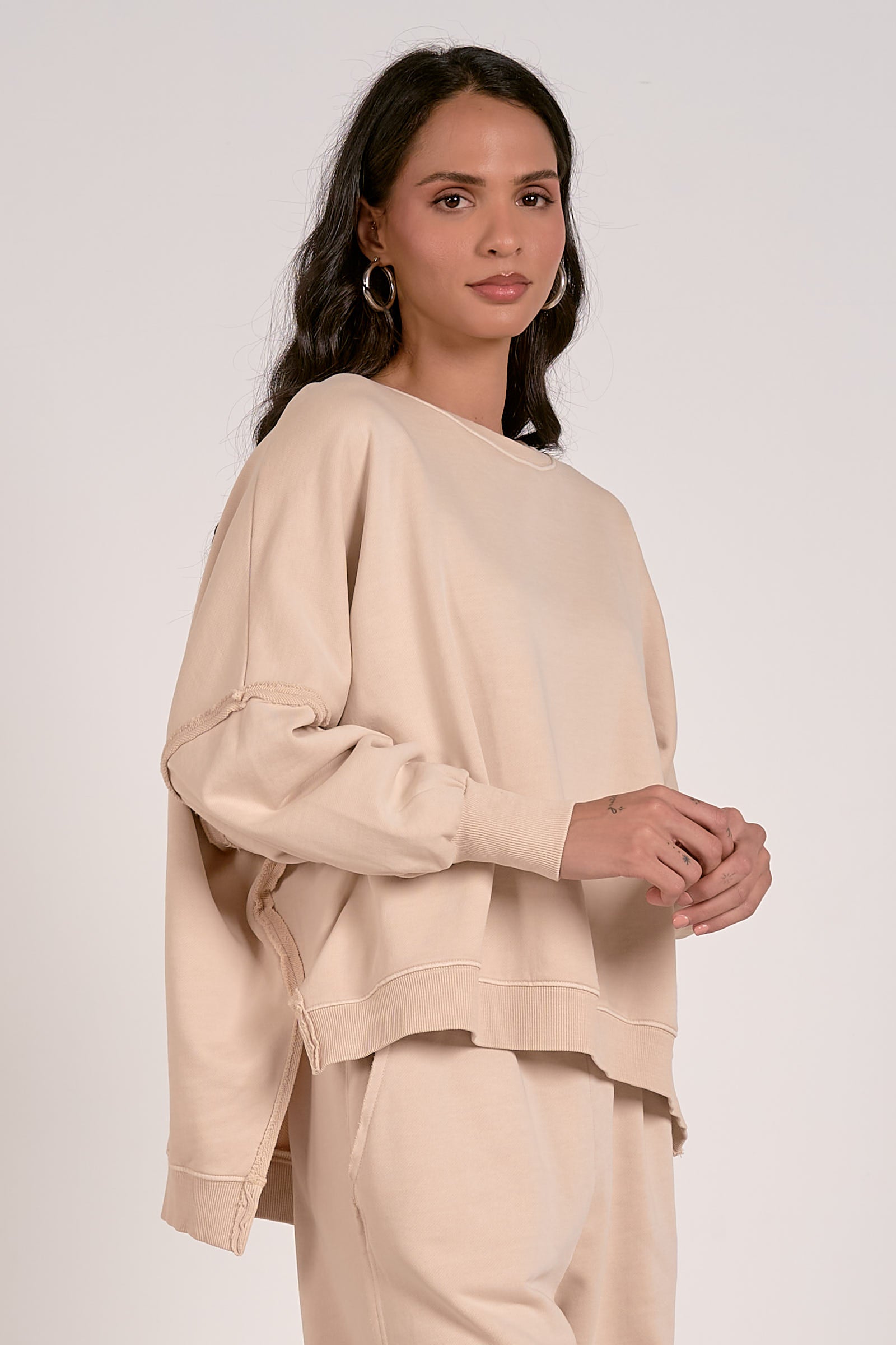 OVERSIZED CREWNECK SWEATSHIRT IN SAND SIDE VIEW
