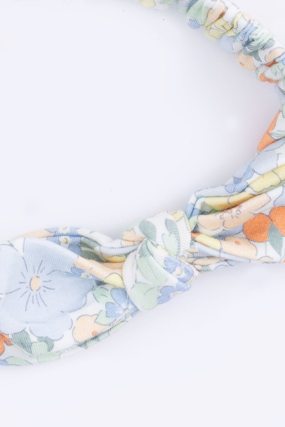 Pastel floral knotted headband bow with layered fabric knot
