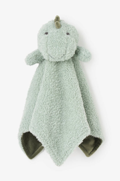 A plush dinosaur comforter featuring a dusty sage green fuzzy body, a small matching horn, embroidered eyes, and a dark olive green underside, shown on a clean white background.