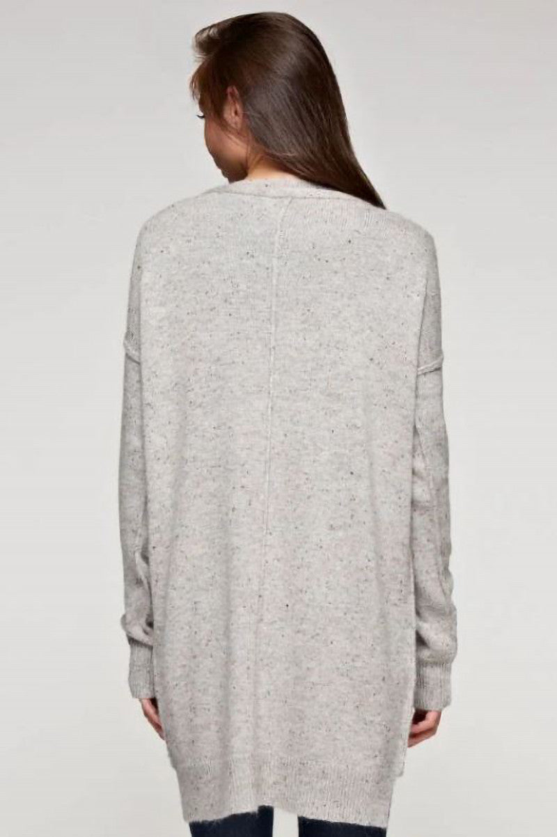 Exposed seam sweater tunic in grey rust melange back view