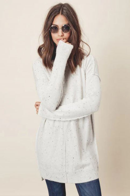 Exposed seam sweater tunic in silver melange front view