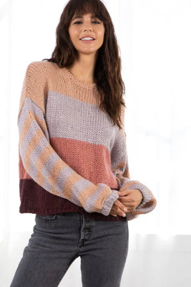 Multi striped long sleeve sweater in peach lavendar front view
