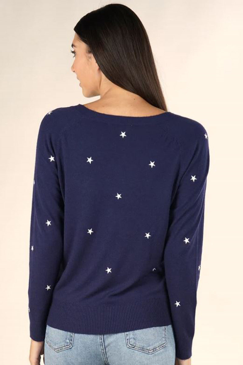 Long sleeve sweater with star embroidery detail in navy ivory back view