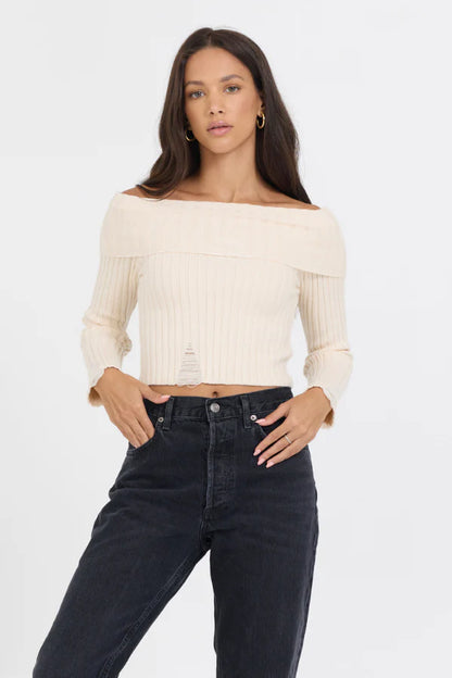 Distressed off the shoulder sweater in ivory front view