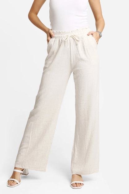 Beige linen wide-leg pants with elastic waistband and drawstring, relaxed ankle length