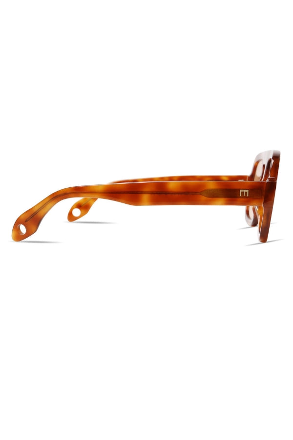 Amber tortoiseshell sunglasses, side view with curved temple arm
