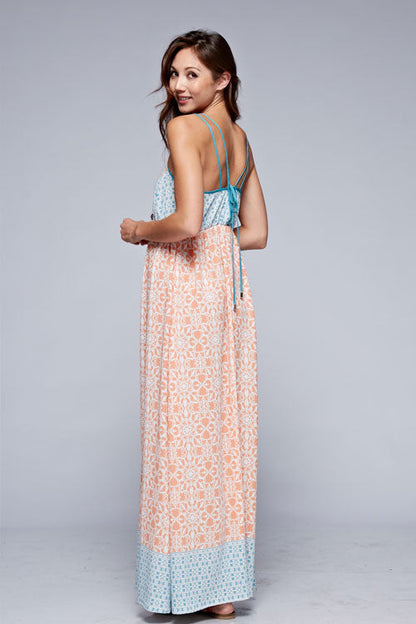 Floral sleeveless maxi dress back detail in coral with blue hem border and tie back