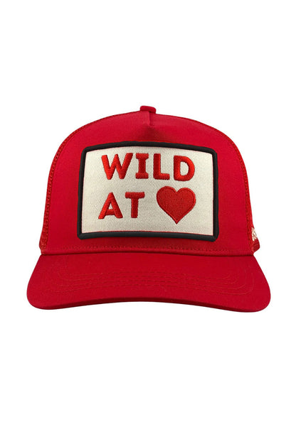 Wild at heart trucker hat in red front view
