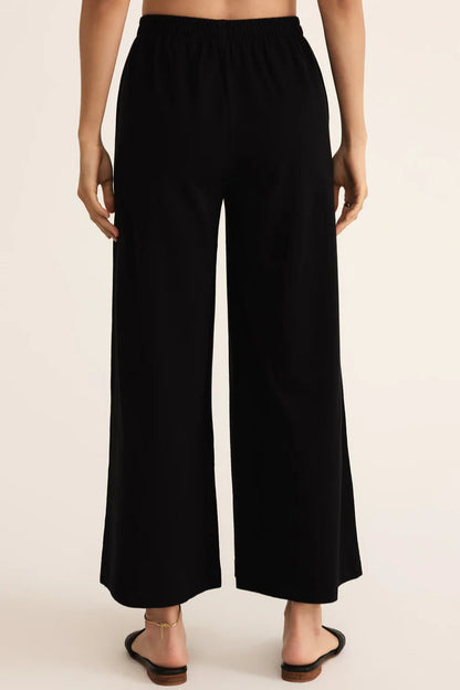 SCOUT JERSEY FLARE PANT IN TRUE BLACK BACK VIEW