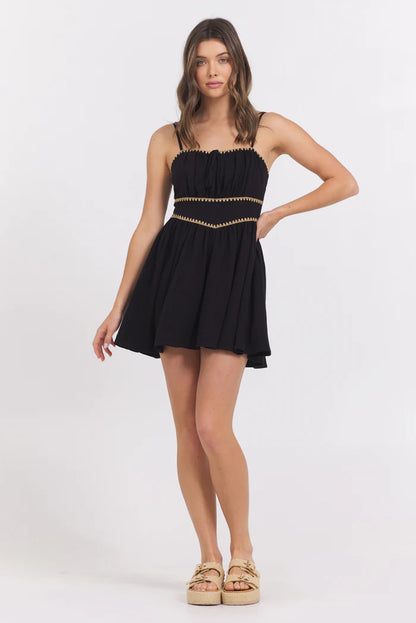 Mini dress with whip stitch in black front view
