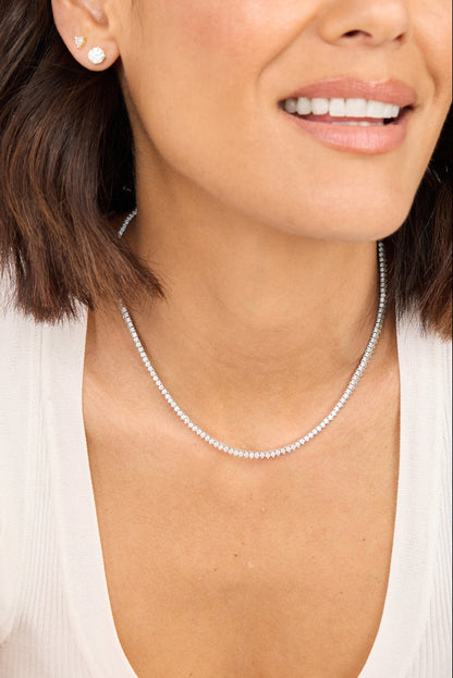 Tennis necklace with white stones on silver-tone chain, 16 in