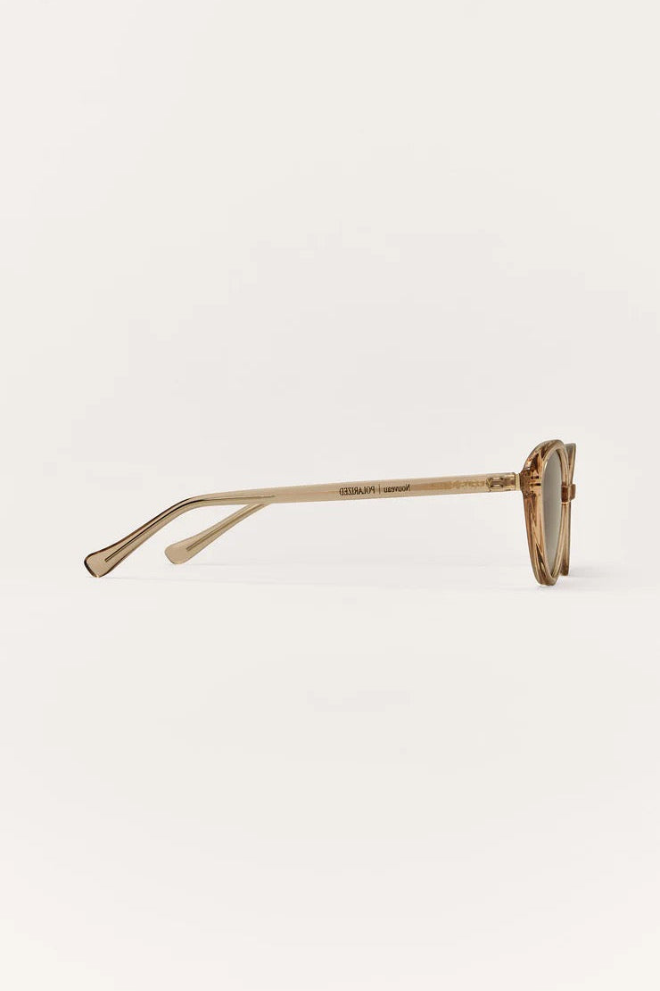 Lunettes de soleil NEW SUNGLASSES vue de côté, monture dorée fine et verres brun