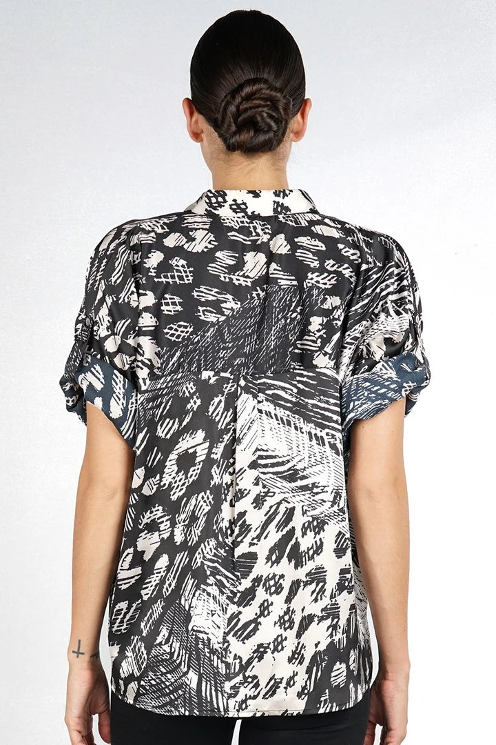 Button down top with cuffed sleeve in black natural back view