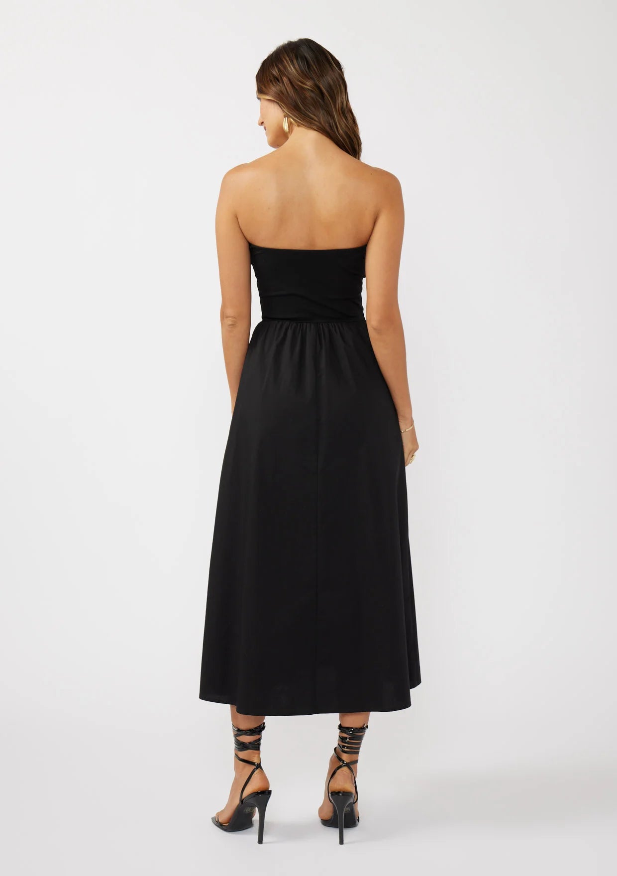 Tube dress with pockets in black back view