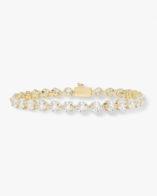She's an icon tennis bracelet in gold with white diamonds