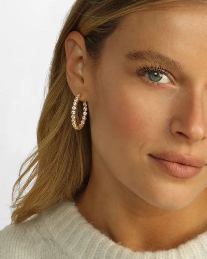 Baroness 1.25" hoop earrings in gold with white diamonds style view