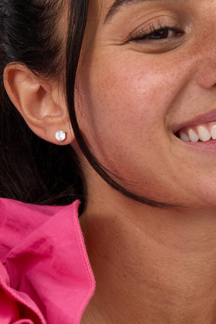 Round clear-stone stud earring with silver-tone post