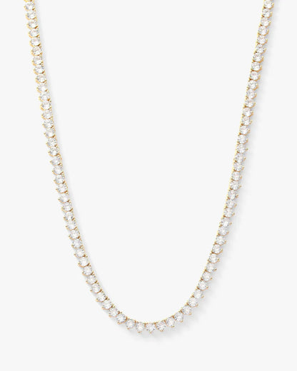 Not your basic tennis necklace 16" in gold with white diamonds 